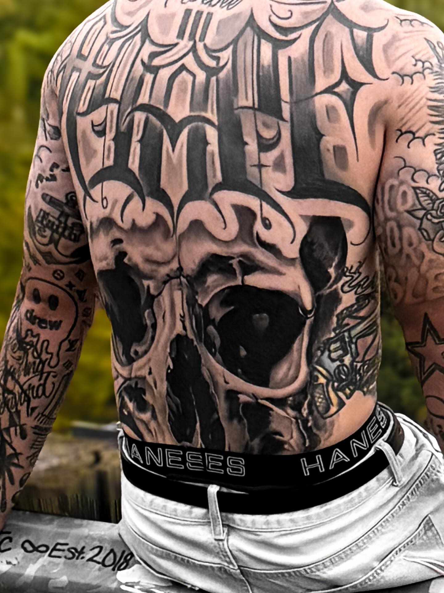 Large black and grey tattoo